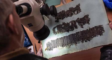 studying-ancient-scrolls studying-ancient-scrolls