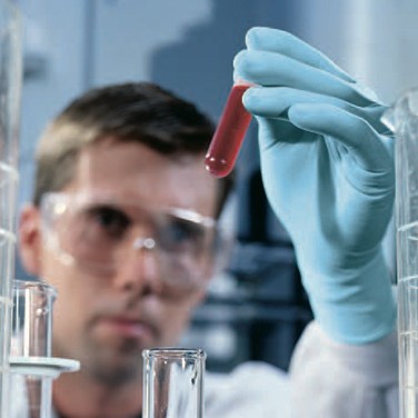 reduce-strain-ergonimically-certified-gloves-19-0729 A scientist using Ansell ergonomically certified gloves